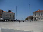 Tartini Square - Tartini Square - Southwest part with main entrance on the square and stone flag poles Tartini Square - Tartini Square - Southwest part with main entrance on the square and stone flag poles